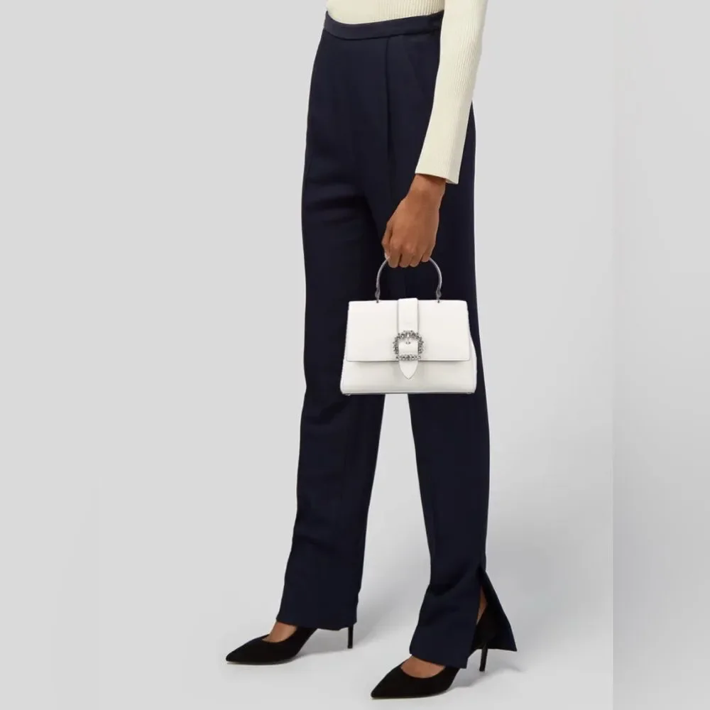 Jimmy Choo signs wear